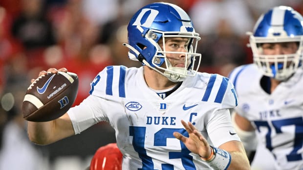 Duke QB Riley Leonard throws the ball